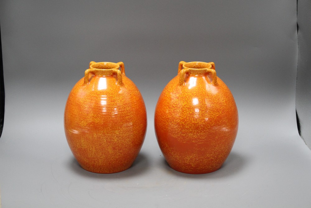 A pair of Royal Lancastrian speckle orange glazed vases, impressed 3134, height 22cm